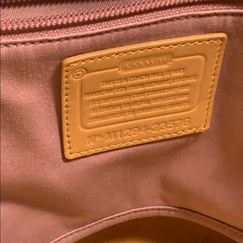 Coach leather zipper Neverfull tote w/metal tag